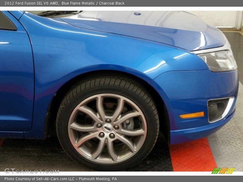 Blue Flame Metallic / Charcoal Black 2012 Ford Fusion SEL V6 AWD