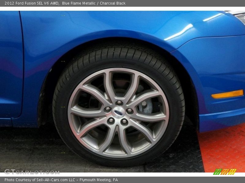 Blue Flame Metallic / Charcoal Black 2012 Ford Fusion SEL V6 AWD