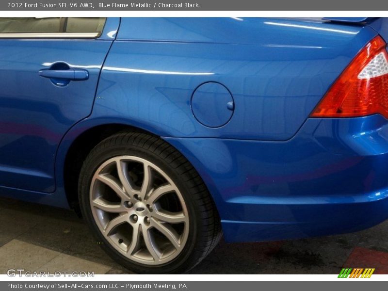 Blue Flame Metallic / Charcoal Black 2012 Ford Fusion SEL V6 AWD