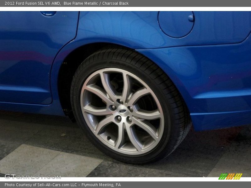 Blue Flame Metallic / Charcoal Black 2012 Ford Fusion SEL V6 AWD