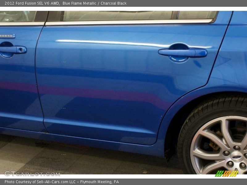 Blue Flame Metallic / Charcoal Black 2012 Ford Fusion SEL V6 AWD