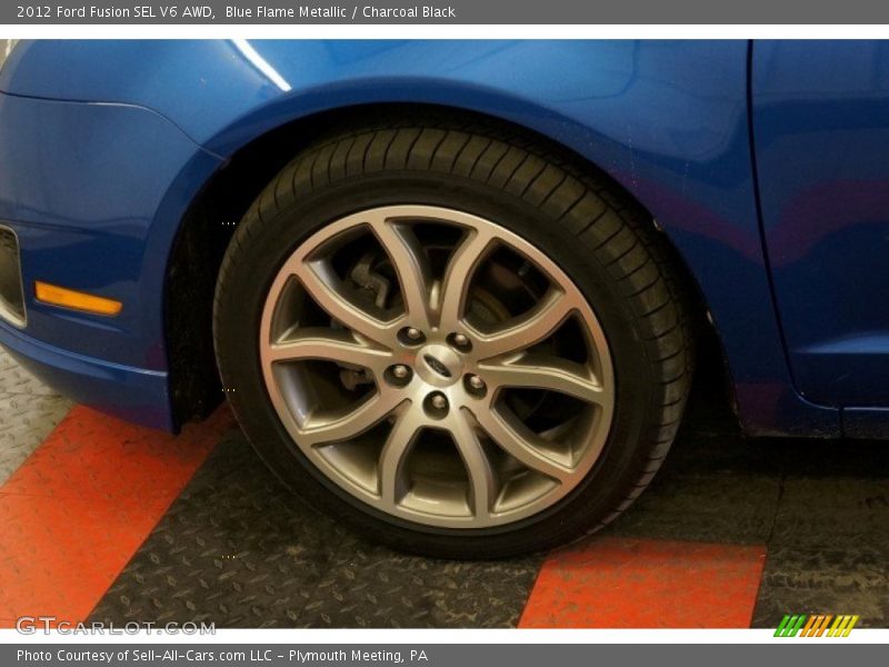 Blue Flame Metallic / Charcoal Black 2012 Ford Fusion SEL V6 AWD