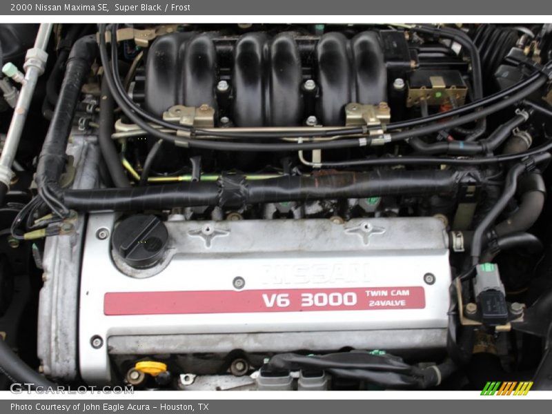 Super Black / Frost 2000 Nissan Maxima SE