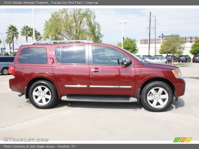  2010 Armada Titanium Tuscan Sun Red Pearl