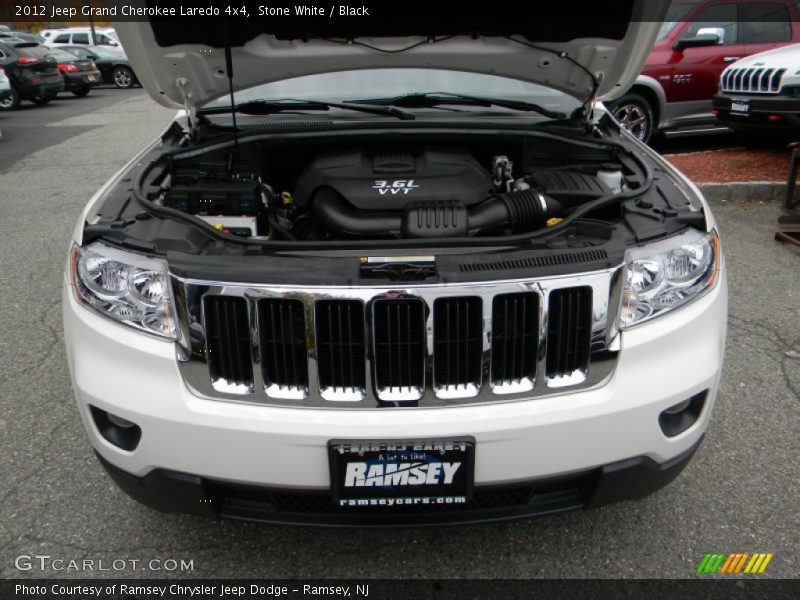 Stone White / Black 2012 Jeep Grand Cherokee Laredo 4x4