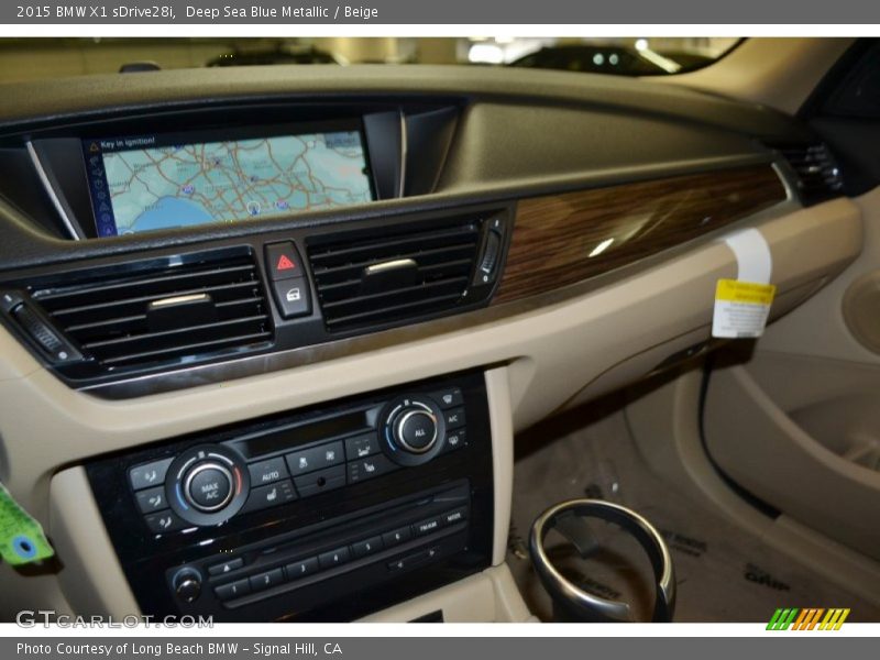 Deep Sea Blue Metallic / Beige 2015 BMW X1 sDrive28i