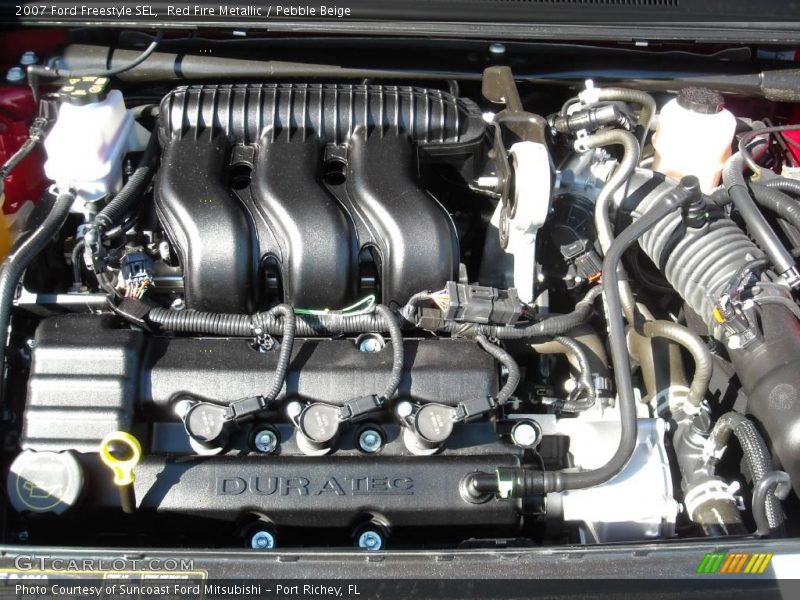 Red Fire Metallic / Pebble Beige 2007 Ford Freestyle SEL