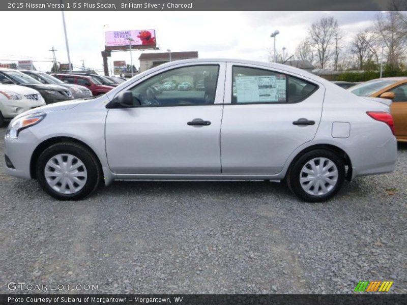 Brilliant Silver / Charcoal 2015 Nissan Versa 1.6 S Plus Sedan