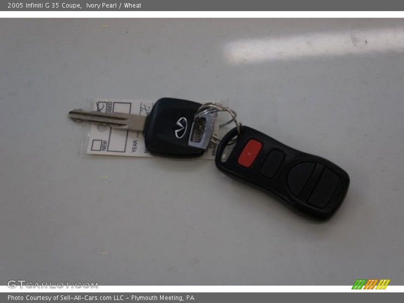 Ivory Pearl / Wheat 2005 Infiniti G 35 Coupe
