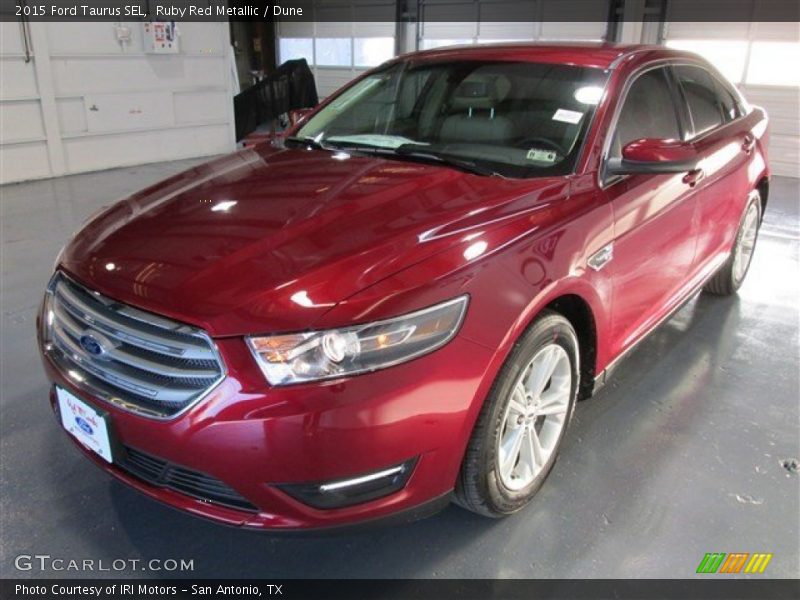 Ruby Red Metallic / Dune 2015 Ford Taurus SEL