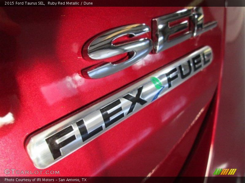 Ruby Red Metallic / Dune 2015 Ford Taurus SEL