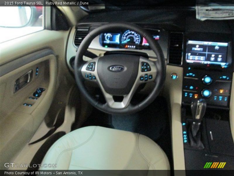 Ruby Red Metallic / Dune 2015 Ford Taurus SEL