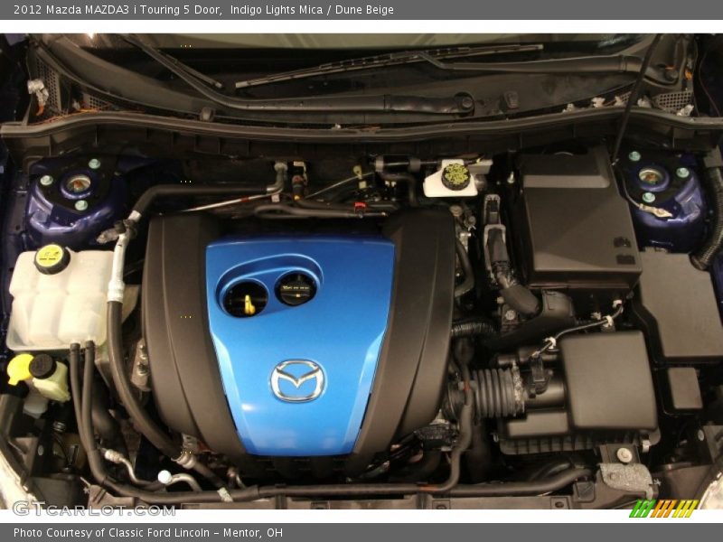 Indigo Lights Mica / Dune Beige 2012 Mazda MAZDA3 i Touring 5 Door