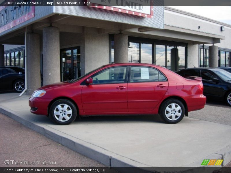 Impulse Red Pearl / Beige 2006 Toyota Corolla LE