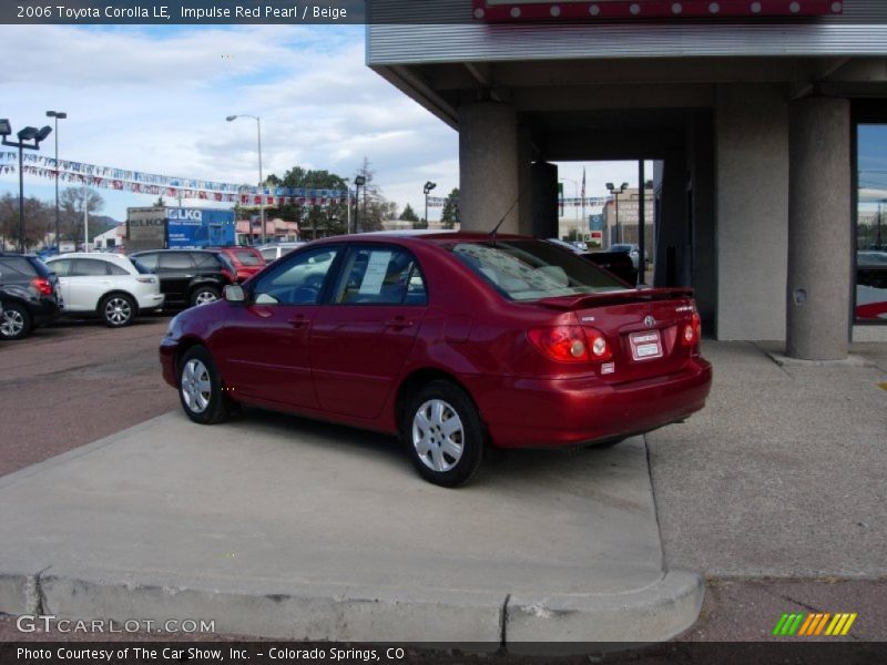 Impulse Red Pearl / Beige 2006 Toyota Corolla LE