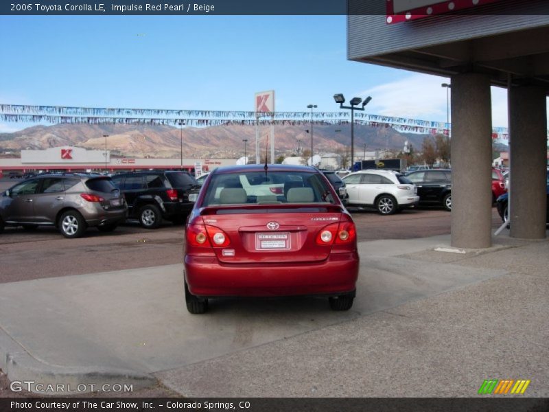 Impulse Red Pearl / Beige 2006 Toyota Corolla LE