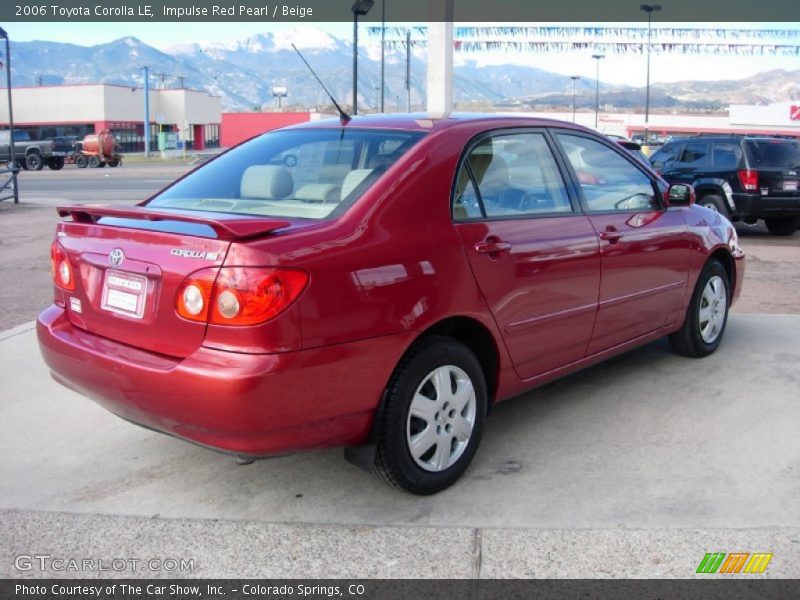 Impulse Red Pearl / Beige 2006 Toyota Corolla LE