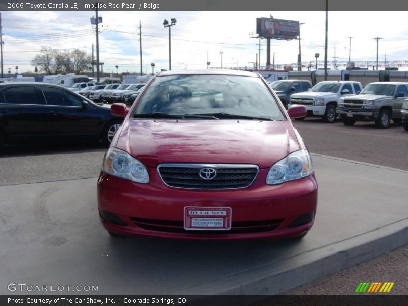 Impulse Red Pearl / Beige 2006 Toyota Corolla LE