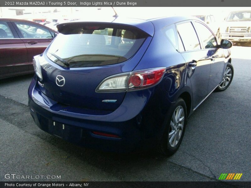 Indigo Lights Mica / Dune Beige 2012 Mazda MAZDA3 i Touring 5 Door