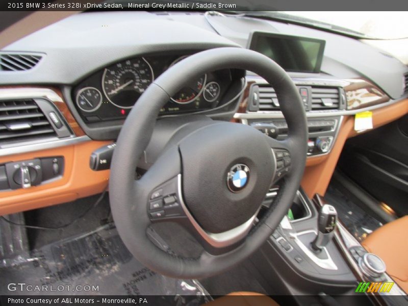 Mineral Grey Metallic / Saddle Brown 2015 BMW 3 Series 328i xDrive Sedan