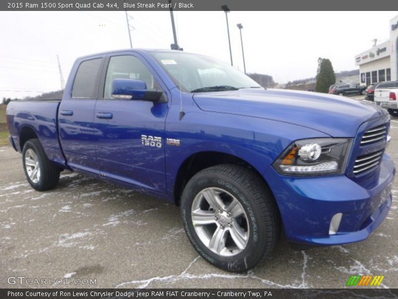 Front 3/4 View of 2015 1500 Sport Quad Cab 4x4