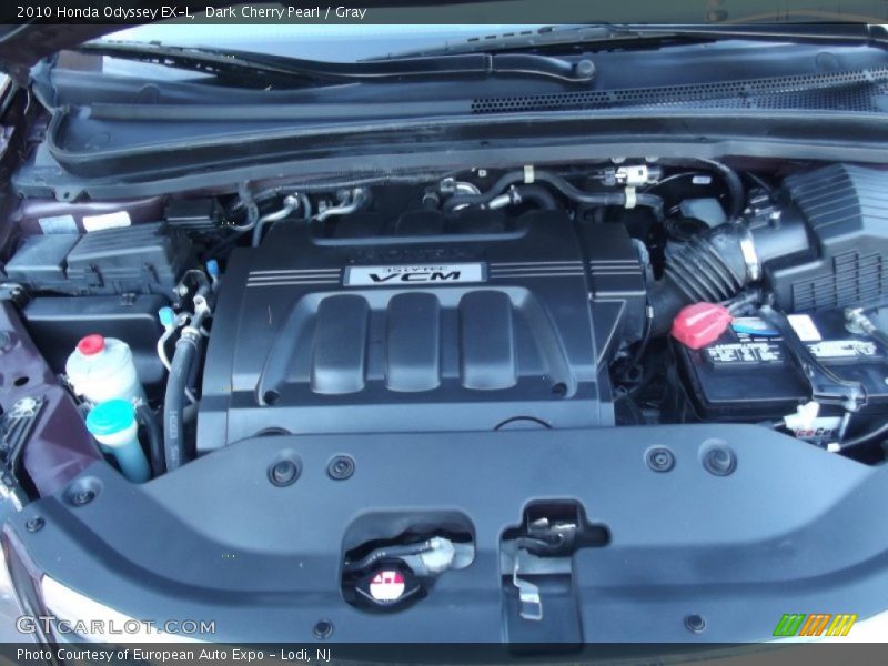 Dark Cherry Pearl / Gray 2010 Honda Odyssey EX-L