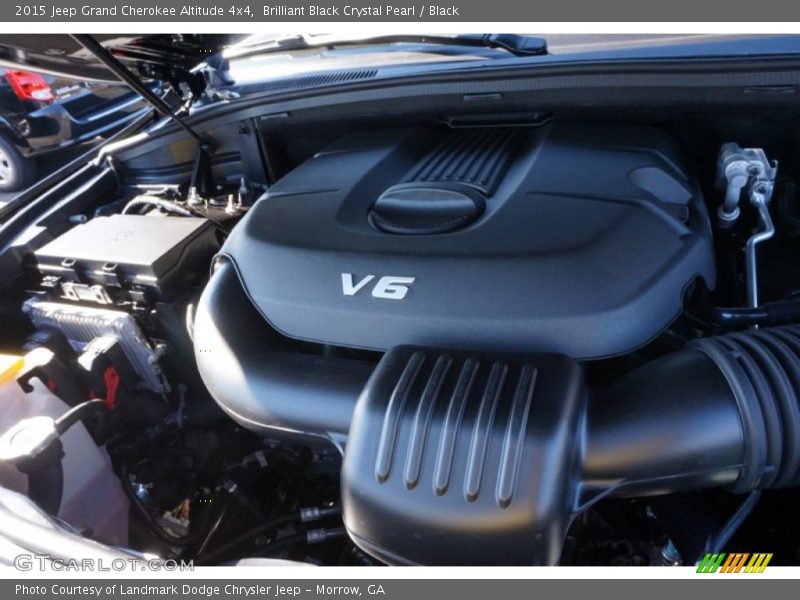 Brilliant Black Crystal Pearl / Black 2015 Jeep Grand Cherokee Altitude 4x4