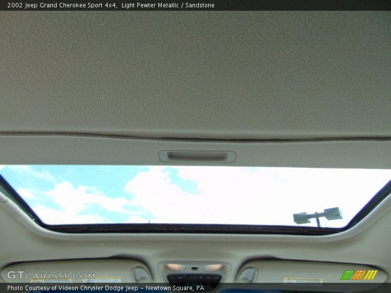 Light Pewter Metallic / Sandstone 2002 Jeep Grand Cherokee Sport 4x4