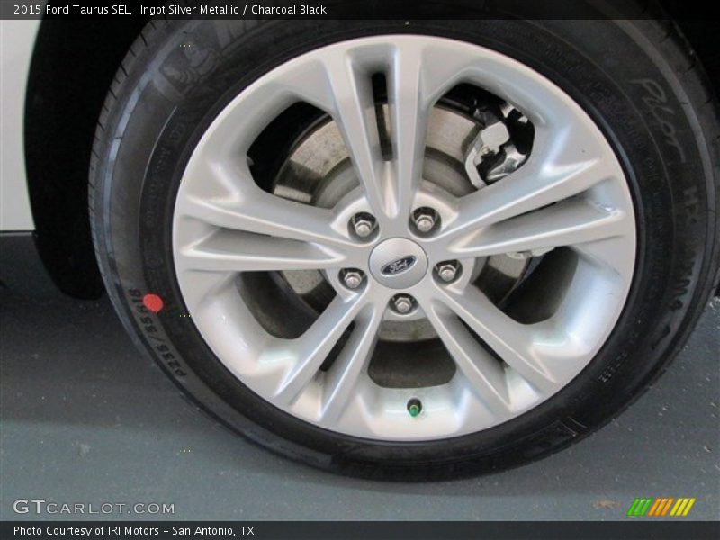 Ingot Silver Metallic / Charcoal Black 2015 Ford Taurus SEL