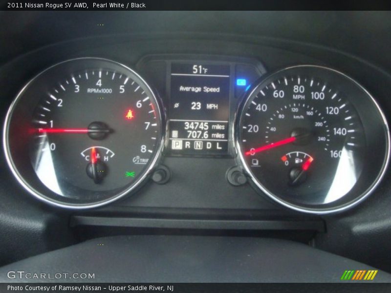 Pearl White / Black 2011 Nissan Rogue SV AWD