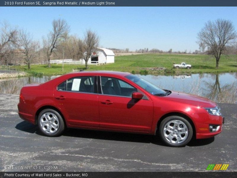 Sangria Red Metallic / Medium Light Stone 2010 Ford Fusion SE