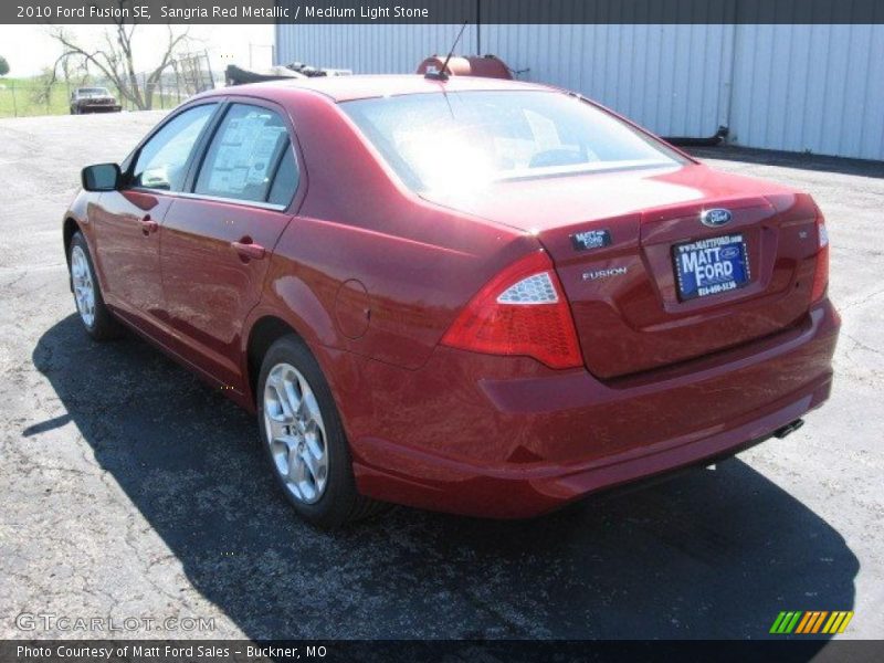 Sangria Red Metallic / Medium Light Stone 2010 Ford Fusion SE