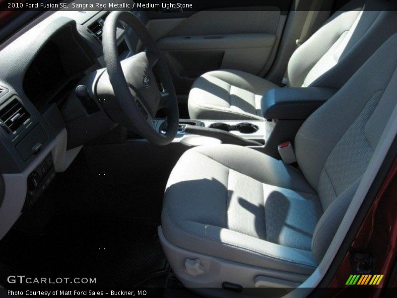 Sangria Red Metallic / Medium Light Stone 2010 Ford Fusion SE