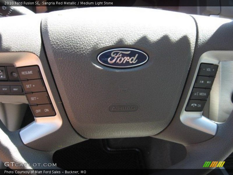 Sangria Red Metallic / Medium Light Stone 2010 Ford Fusion SE