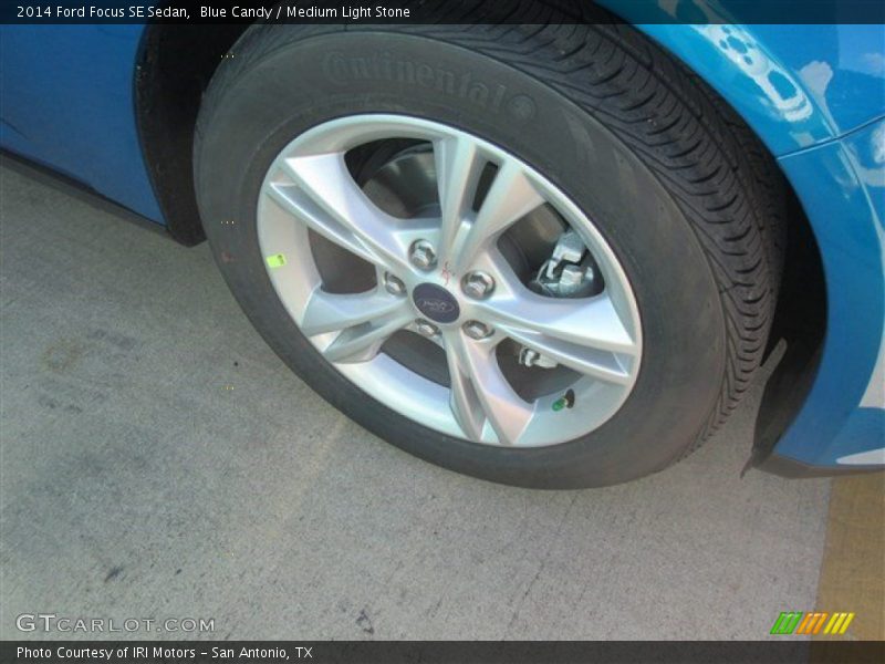 Blue Candy / Medium Light Stone 2014 Ford Focus SE Sedan