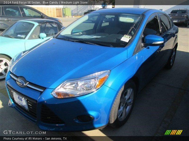 Blue Candy / Medium Light Stone 2014 Ford Focus SE Sedan
