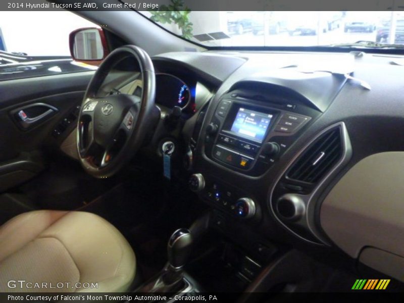Garnet Red / Beige 2014 Hyundai Tucson SE AWD