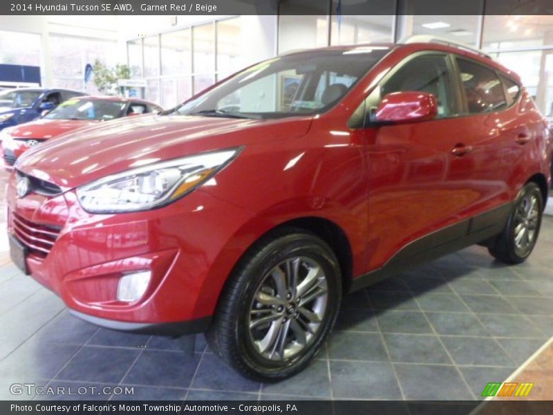 Garnet Red / Beige 2014 Hyundai Tucson SE AWD