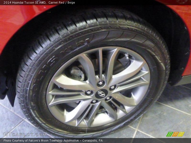 Garnet Red / Beige 2014 Hyundai Tucson SE AWD