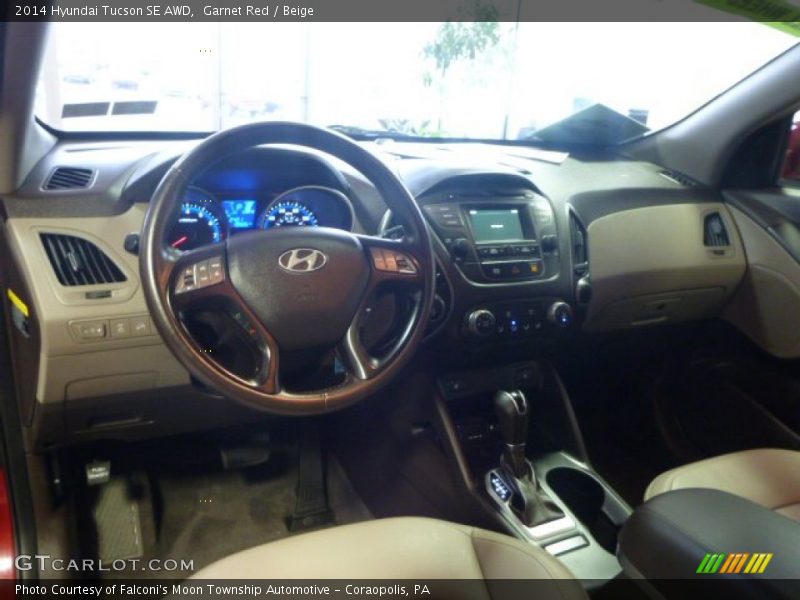 Garnet Red / Beige 2014 Hyundai Tucson SE AWD