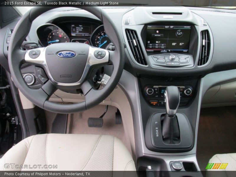 Tuxedo Black Metallic / Medium Light Stone 2015 Ford Escape SE