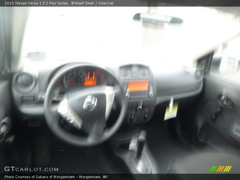 Brilliant Silver / Charcoal 2015 Nissan Versa 1.6 S Plus Sedan