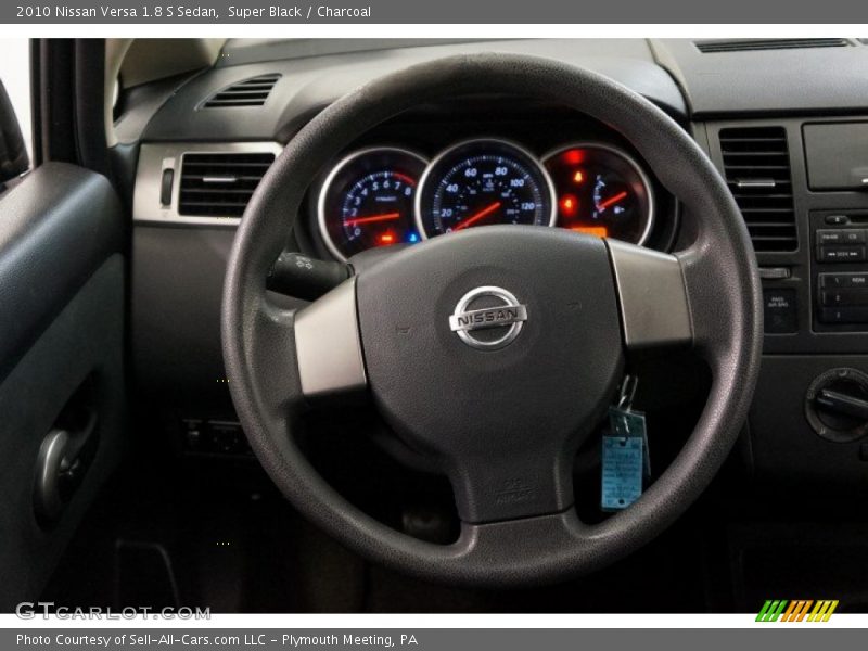 Super Black / Charcoal 2010 Nissan Versa 1.8 S Sedan