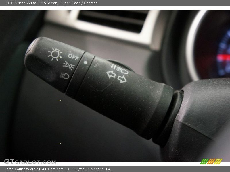 Super Black / Charcoal 2010 Nissan Versa 1.8 S Sedan