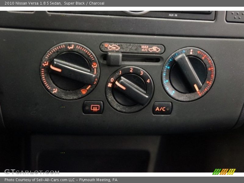 Super Black / Charcoal 2010 Nissan Versa 1.8 S Sedan