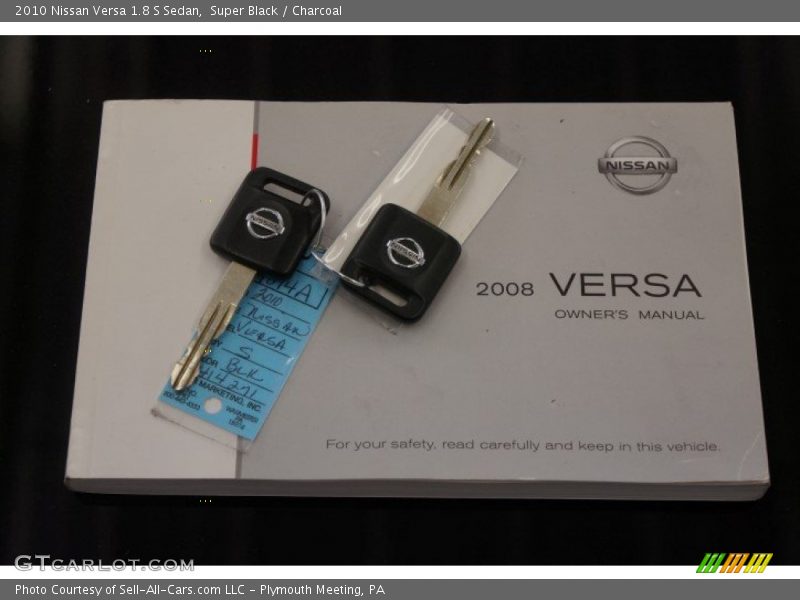 Super Black / Charcoal 2010 Nissan Versa 1.8 S Sedan