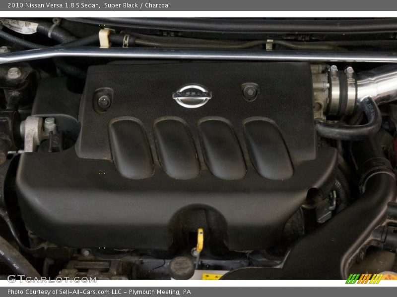 Super Black / Charcoal 2010 Nissan Versa 1.8 S Sedan