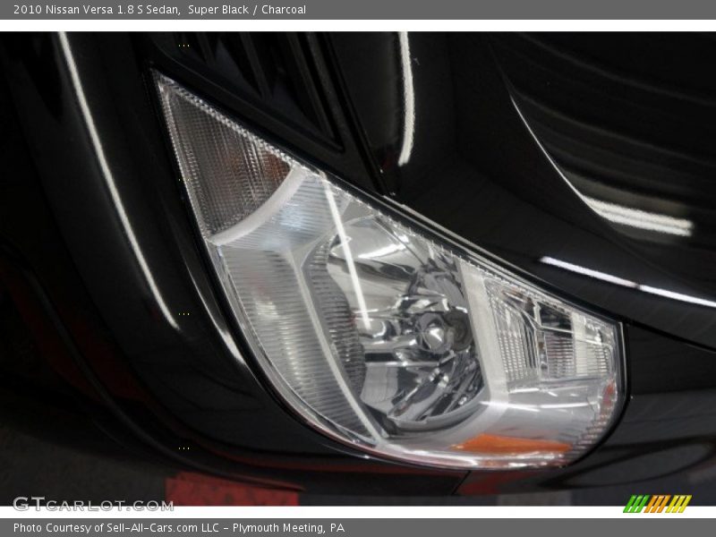 Super Black / Charcoal 2010 Nissan Versa 1.8 S Sedan