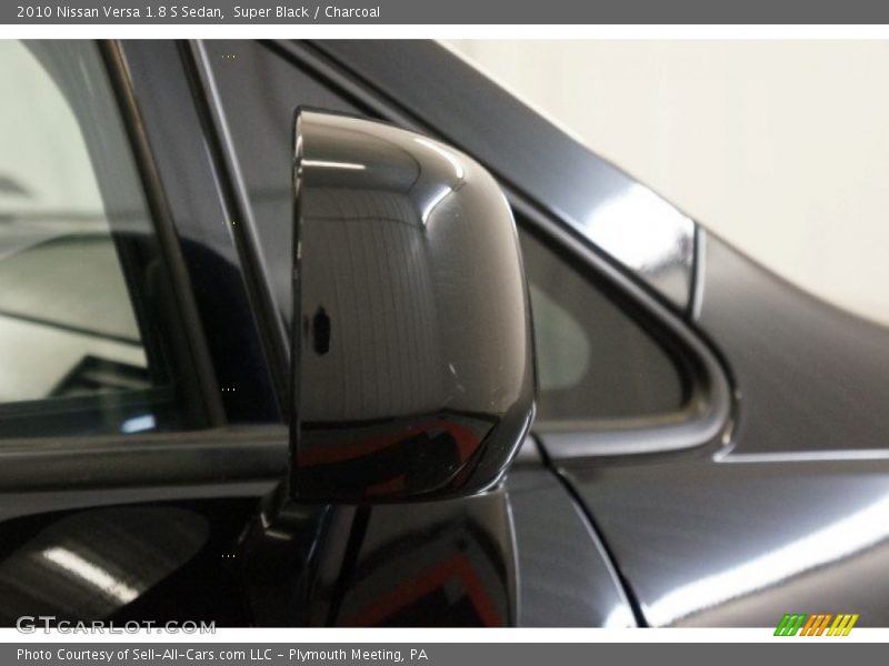 Super Black / Charcoal 2010 Nissan Versa 1.8 S Sedan