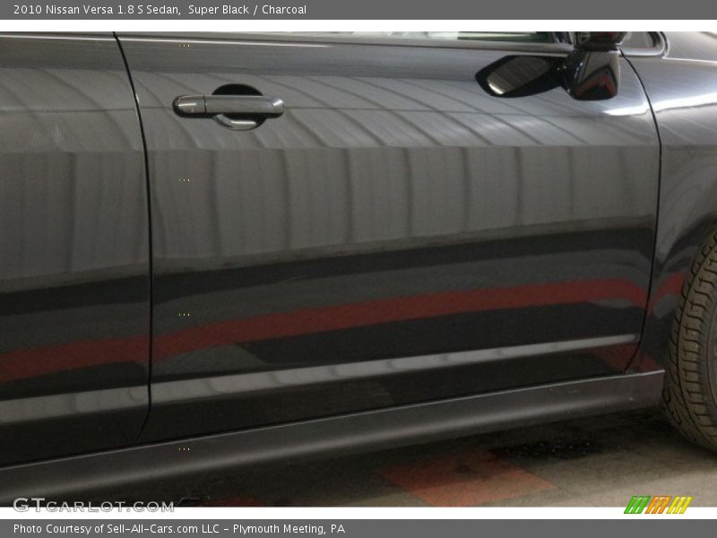 Super Black / Charcoal 2010 Nissan Versa 1.8 S Sedan